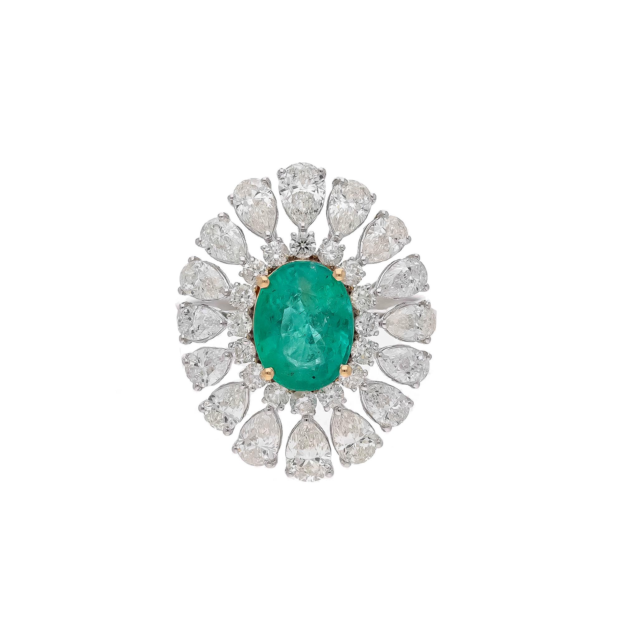 Diamonds : 2.48 carats

Emerald : 1.84carats ( columbian)

Gold : 4.64 gm( 18k)

This is a beautiful natural Columbian ring  with very high quality emeralds and diamonds ( vsi and G colour

Its very hard to capture the true color and luster of the