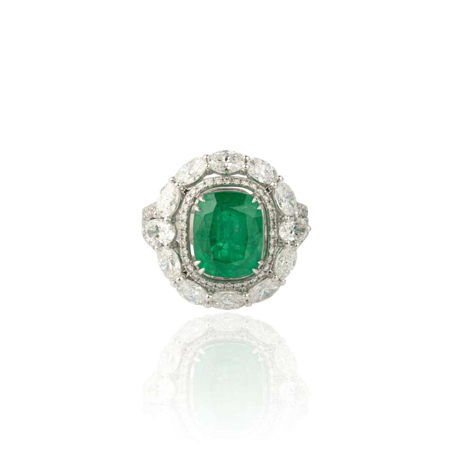 diamonds 1.86cts
emerald 6.16cts
gold  7.49gms



It’s very hard to capture the true color and luster of the stone, I have tried to add pictures which are taken professionally and by me from my I phone to reflect the true image of the item.
Most of