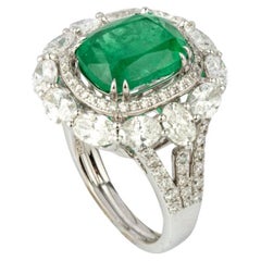 Natural emerald ring with diamond in 18k gold