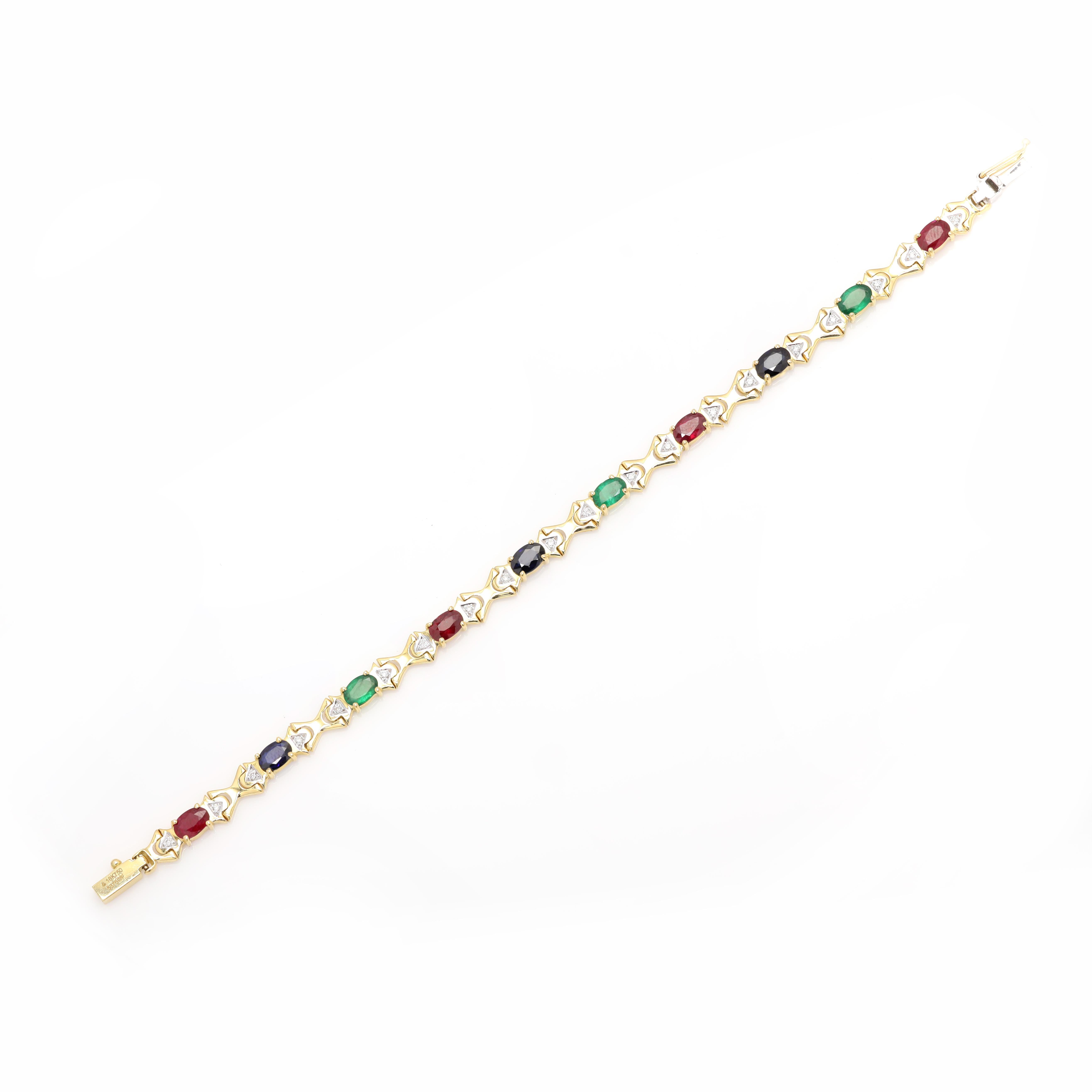 This Emerald, Ruby, Sapphire and Diamond Tennis Bracelet Made in 18K gold showcases 10 endlessly sparkling natural emerald, ruby and sapphire weighing 5.4 carats. It measures 7 inches long in length. Emerald enhances the intellectual capacity of the