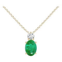 Natural Emerald Solitaire Pendant with Diamond in 14K Yellow Gold 7x5mm