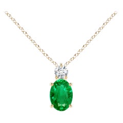 Natural Emerald Solitaire Pendant with Diamond in 14K Yellow Gold 7x5mm