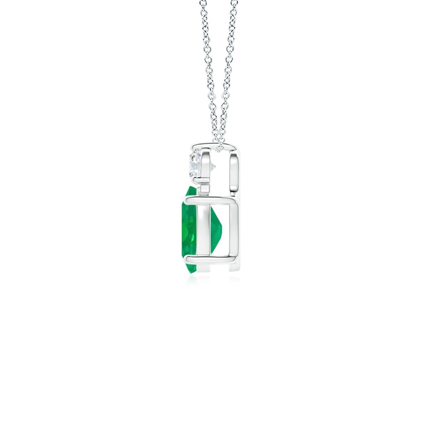 Crafted in Platinum, this classic solitaire emerald pendant personifies elegance. The rich green oval emerald is topped by a sparkling diamond for added allure. The intricate scroll work on the sides enhances this prong set emerald pendant's