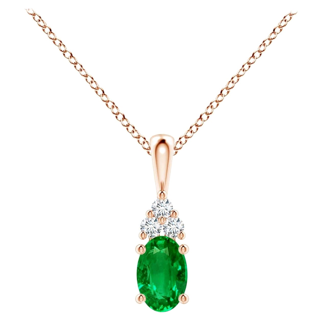 Pendentif solitaire en or rose avec émeraude naturelle et diamant, taille 6 x 4 mm