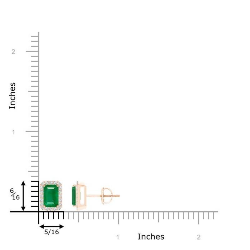These emerald-cut emerald stud earrings offer a distinctive appeal with their defined contours and remarkable brilliance. Glistening diamonds create a fascinating halo around the emeralds and enhance their forest green hue. The diamonds and emeralds