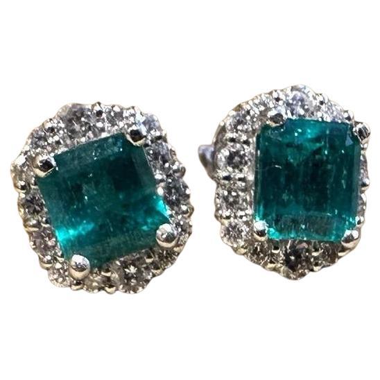 Natural Emerald Stud Earrings with Diamond Halo in Platinum and 18k White Gold
