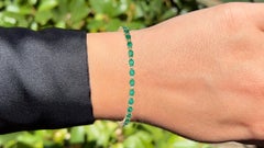 Bracciale tennis con smeraldo naturale e diamanti 4,94 carati in oro giallo 10 carati