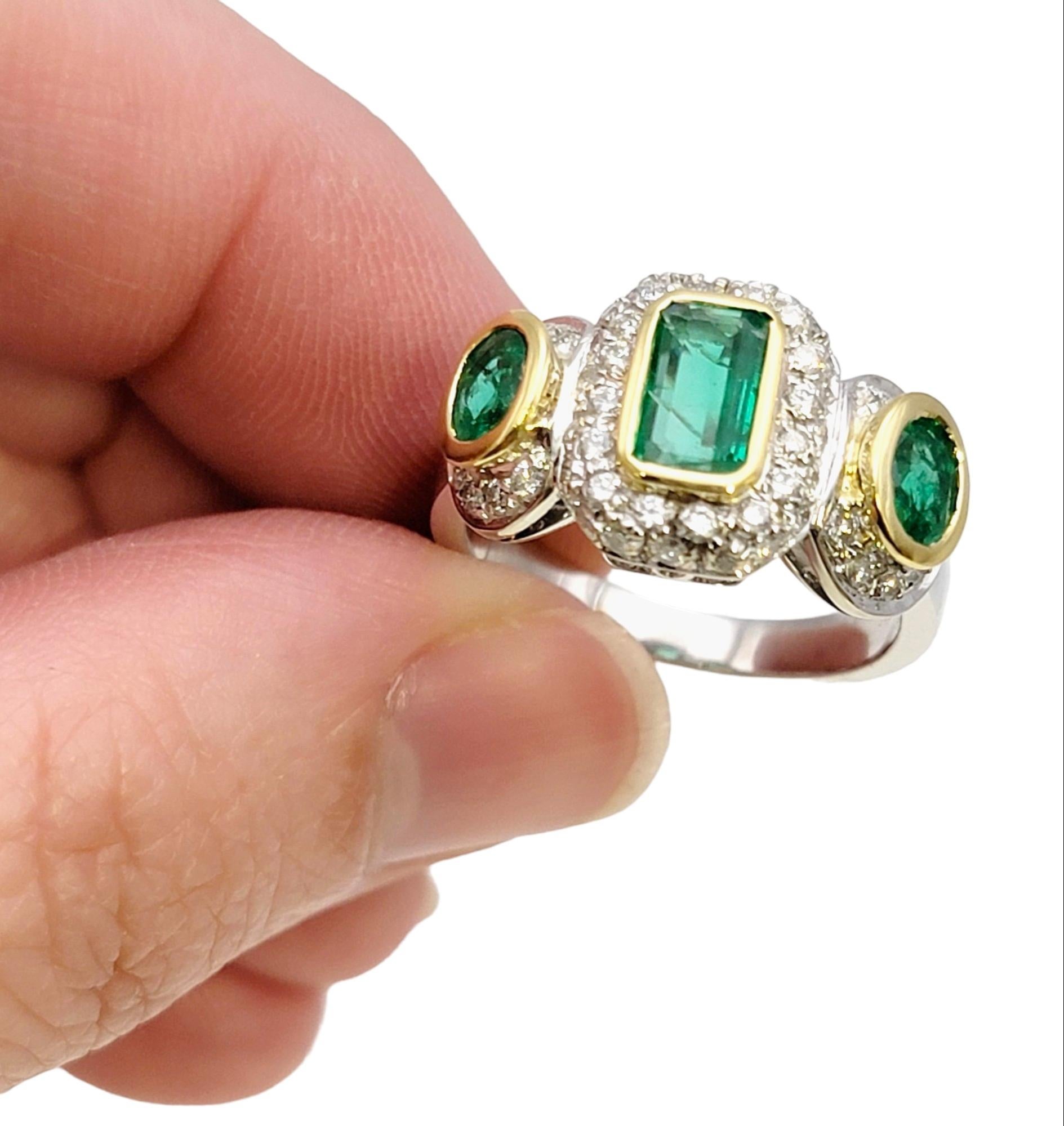 Natural Emerald Three Stone Ring with Pave Diamond Halos in 18 Karat Gold For Sale 7