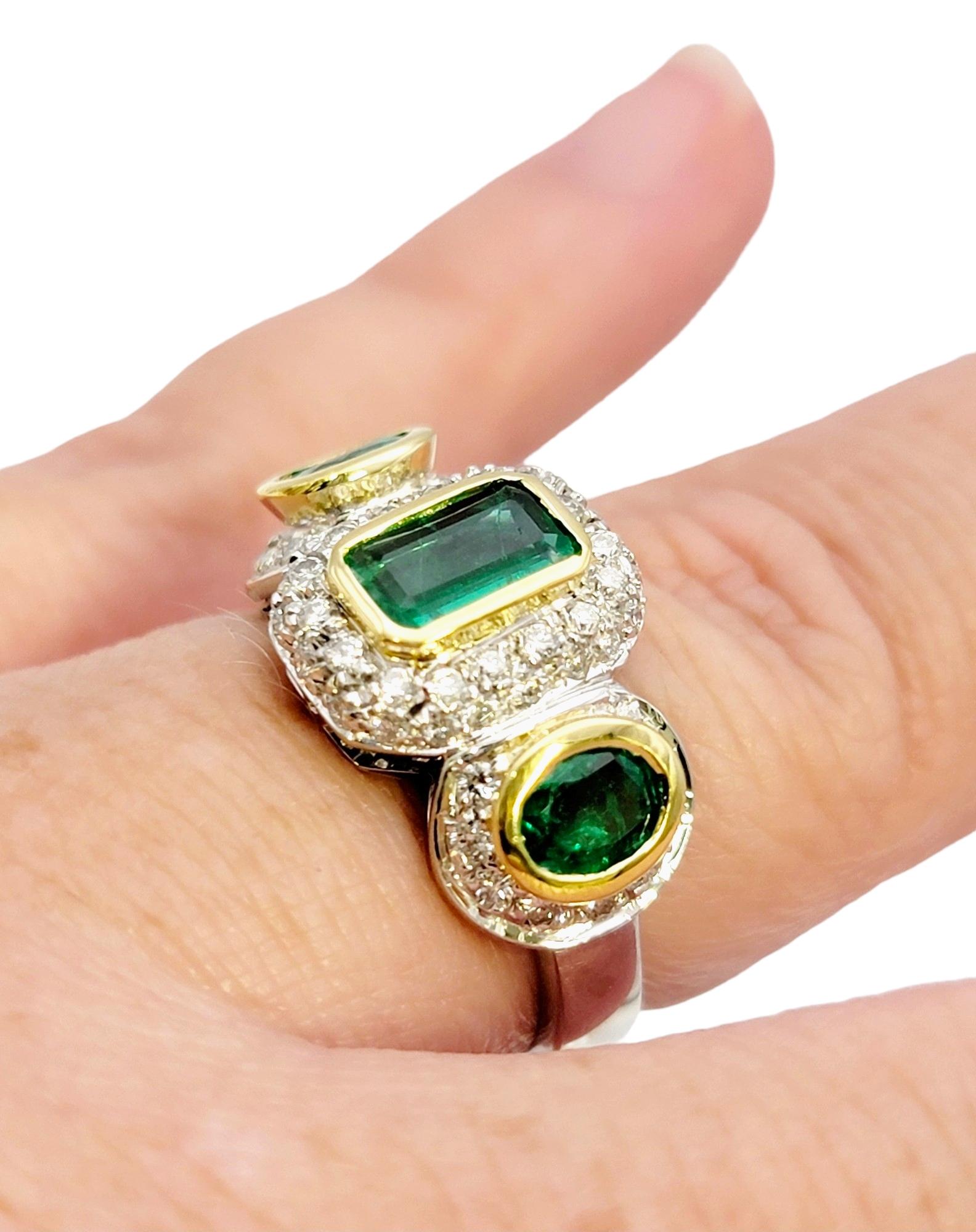 Natural Emerald Three Stone Ring with Pave Diamond Halos in 18 Karat Gold For Sale 9