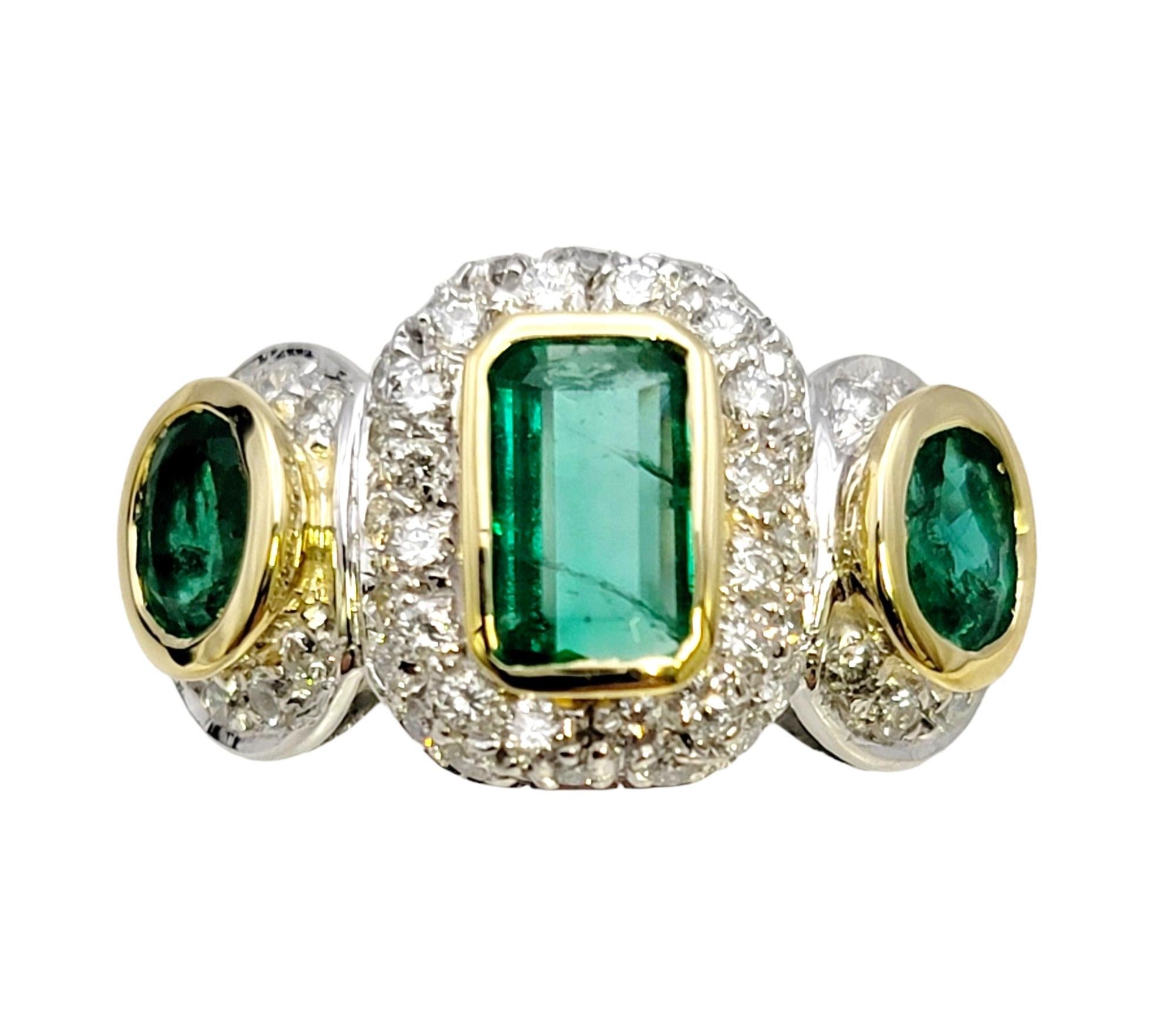 Women's Natural Emerald Three Stone Ring with Pave Diamond Halos in 18 Karat Gold For Sale