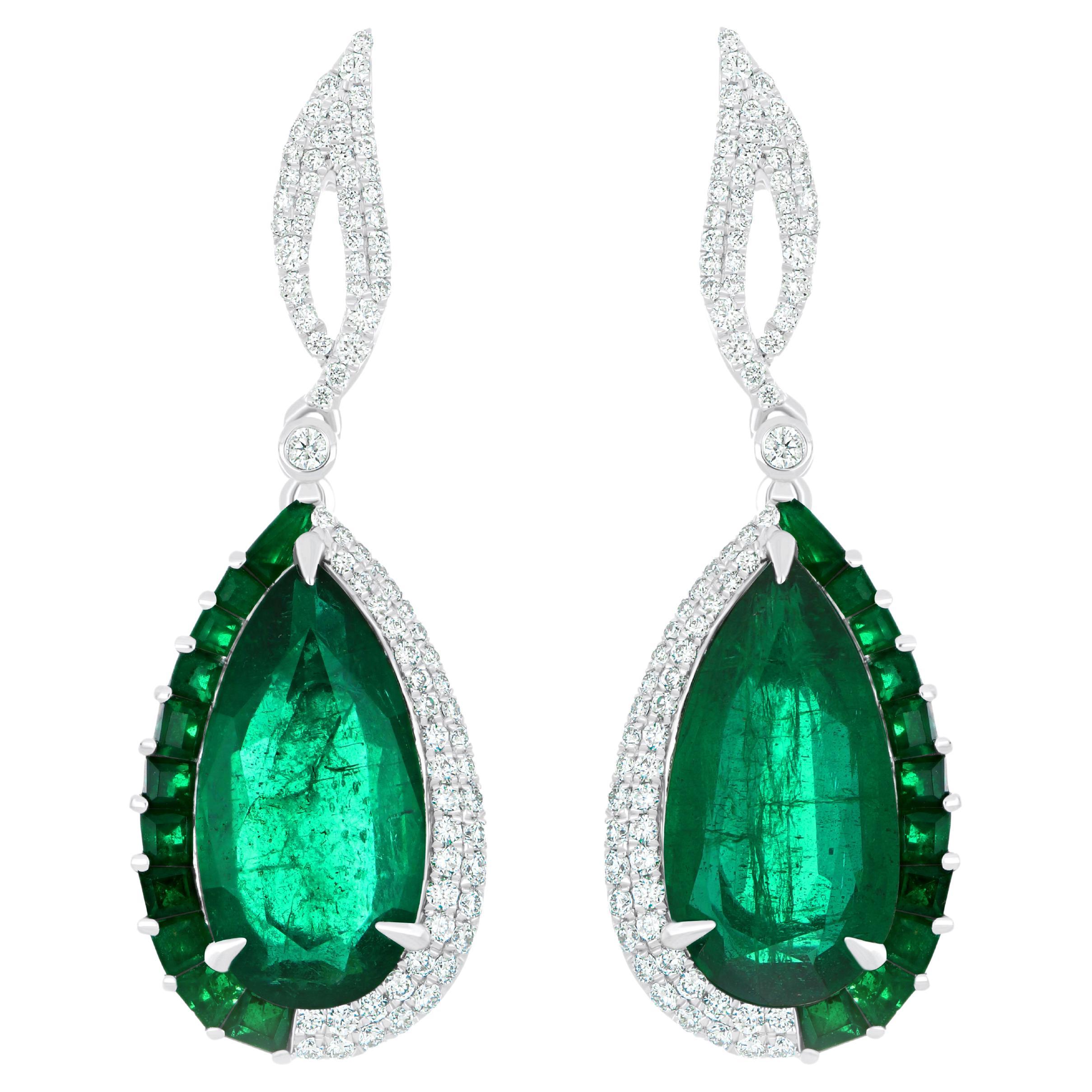 Natural Emeralds and Diamond Studded Drop Earrings in 18kt White Gold For Sale