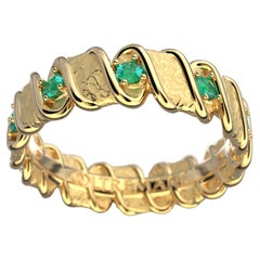 Bracelet d'éternité en or 18 carats fabriqué en Italie avec émeraudes naturelles par Oltremare