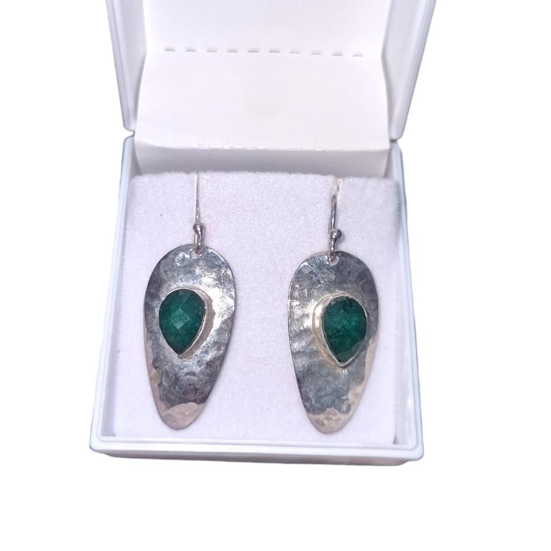 Metal - Sterling silver
Gross Weight - 5.43 Grams
Gemstones - Natural Emeralds

Sterling silver drop earrings with natural emeralds are a stunning addition to any jewelry collection. These elegant earrings are crafted with precision, combining the