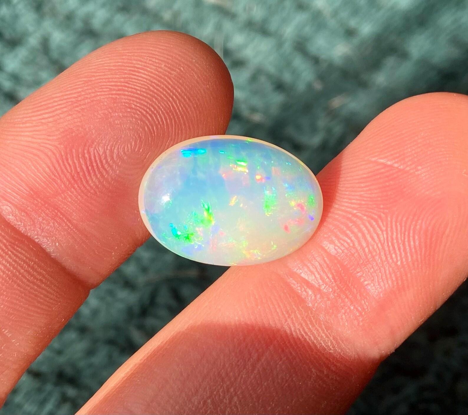 9.45 Ct., Ethiopian Opal
Premium quality.

Stone Origin: Welo, Ethiopia
Stone dimension (mm): 17.76x14.02x7.04 mm
Shape and cut: oval cabochon
Stone treatment: Not Enhanced
Stone creation: Natural
Stone weight: 9.45 Ct.

Notes: These are top quality