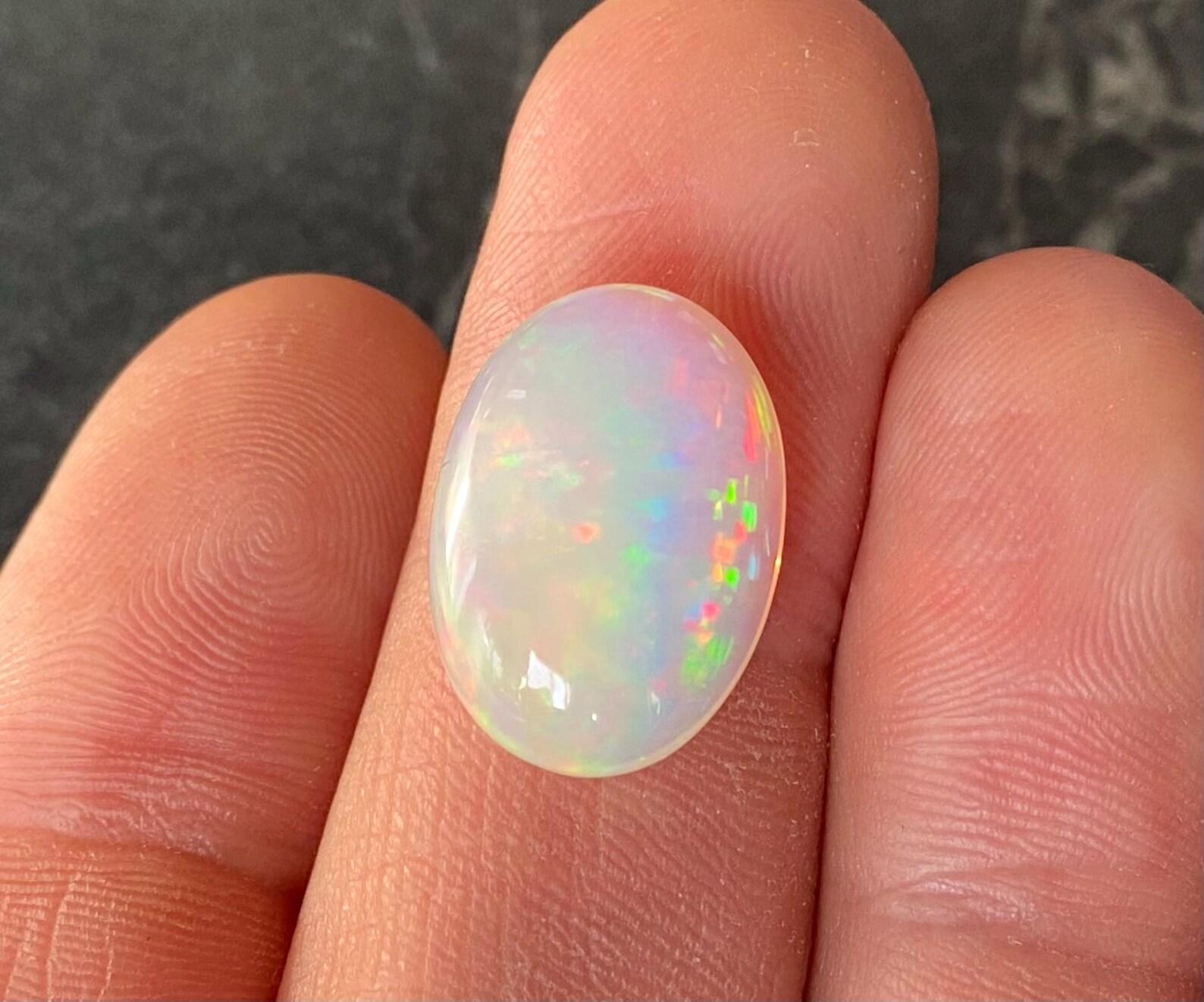 Natural Ethiopian Opal Loose gemstone 9.45ct. Oval cabochon, 17.76x14.02x7.04 mm For Sale 2
