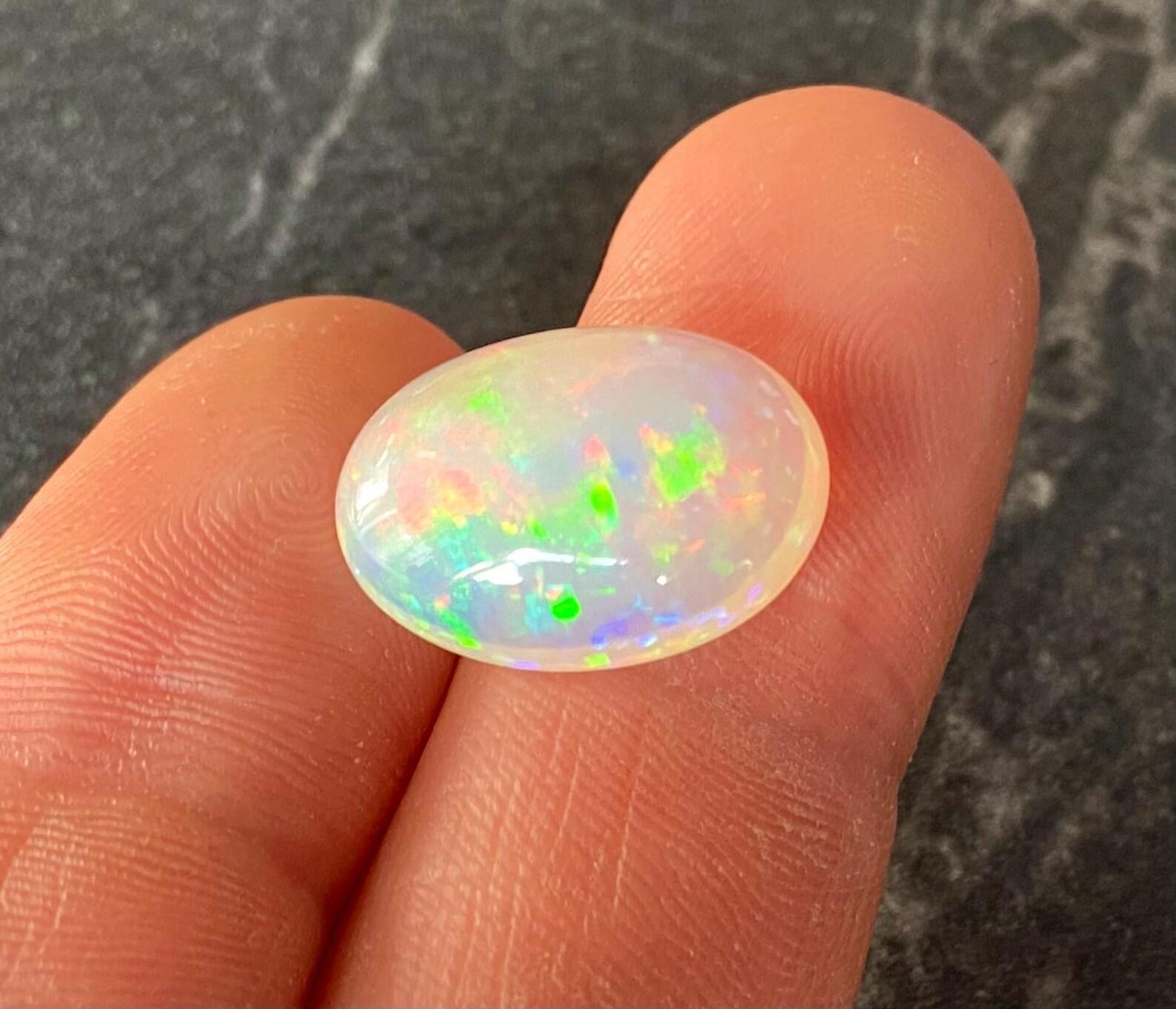 Natural Ethiopian Opal Loose gemstone 9.45ct. Oval cabochon, 17.76x14.02x7.04 mm For Sale 3