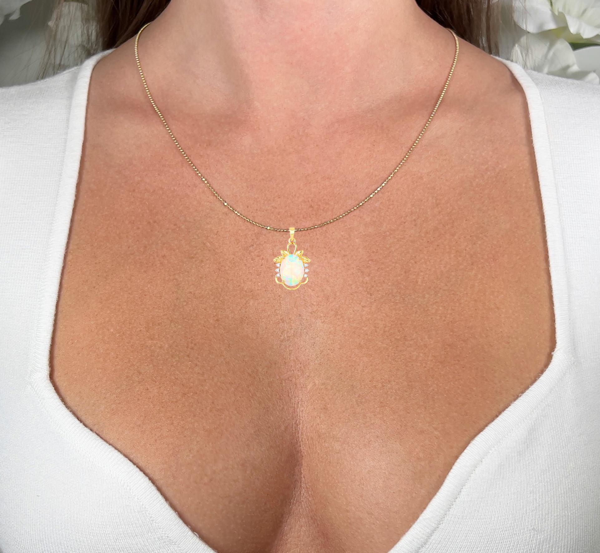 It comes with the Gemological Appraisal by GIA GG/AJP
All Gemstones are Natural
Ethiopian Opal = 3.50 Carats
6 Diamonds = 0.09 Carats
Metal: 14K Yellow Gold
Pendant Dimensions: 28 x 17 mm