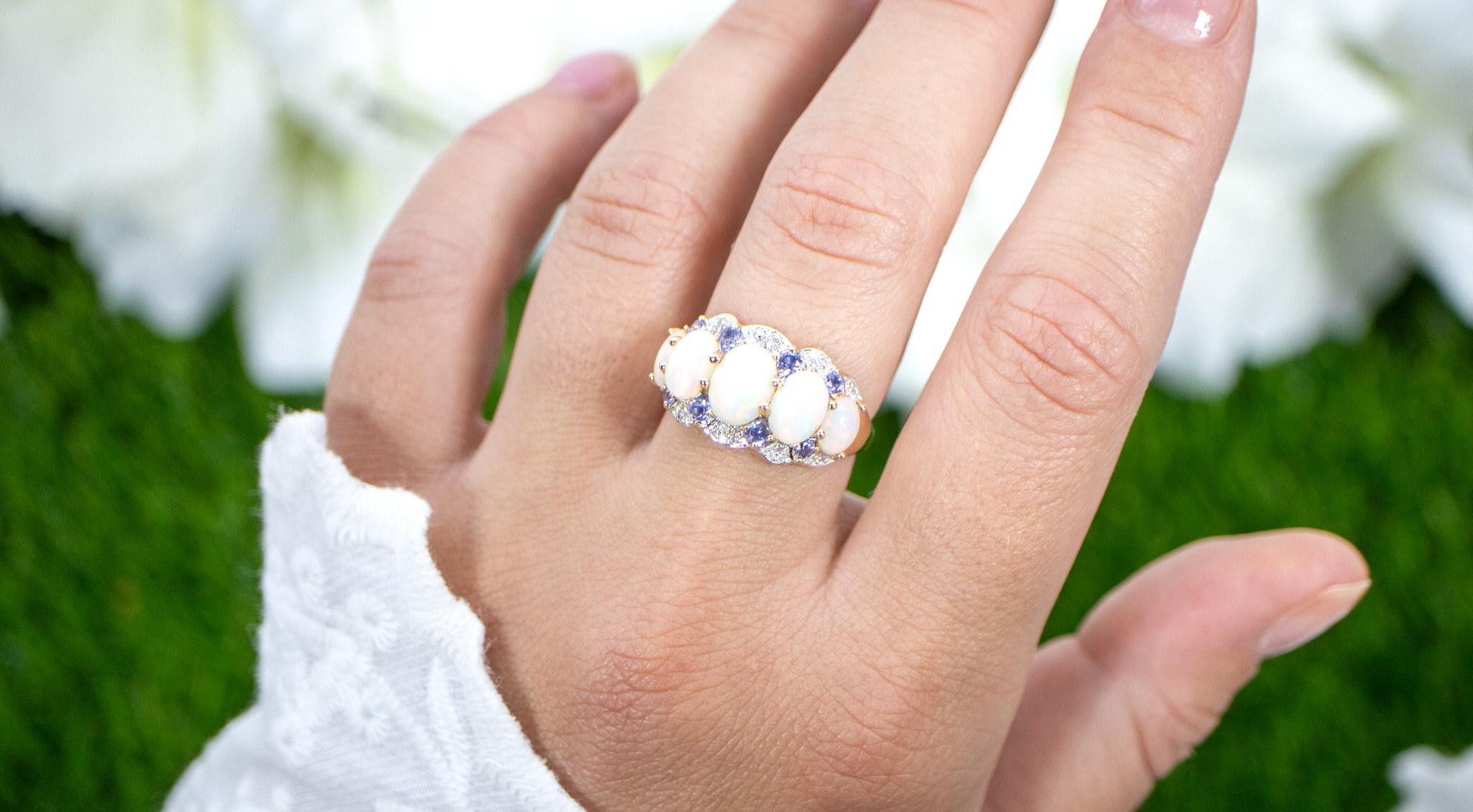 Cabochon Natural Ethiopian Opal Ring Tanzanite and Diamond Setting 14K Yellow Gold For Sale