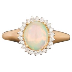 Natürlicher Äthiopischer Opal Ring mit Diamanten 1,22 Karat 9K Gelbgold