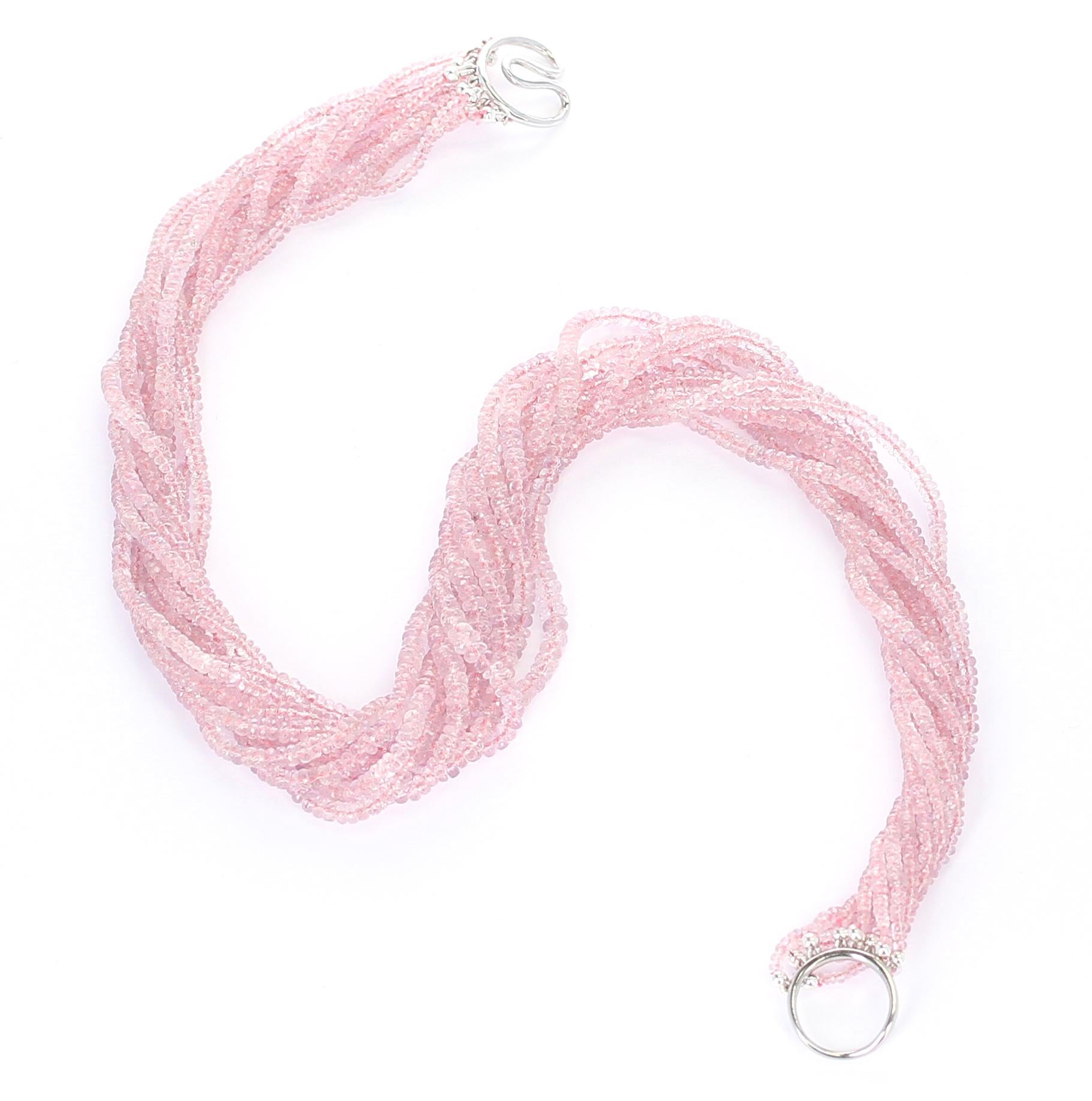 A Natural Faceted Light Pink Sapphire Faceted Beads Choker Necklace with an 18 Karat White Gold clasp, consisting of 10 Lines weighing a total of 626 carats. The length of the necklace is 19 Inches and the size range of the beads are 2.50 to 4MM. We