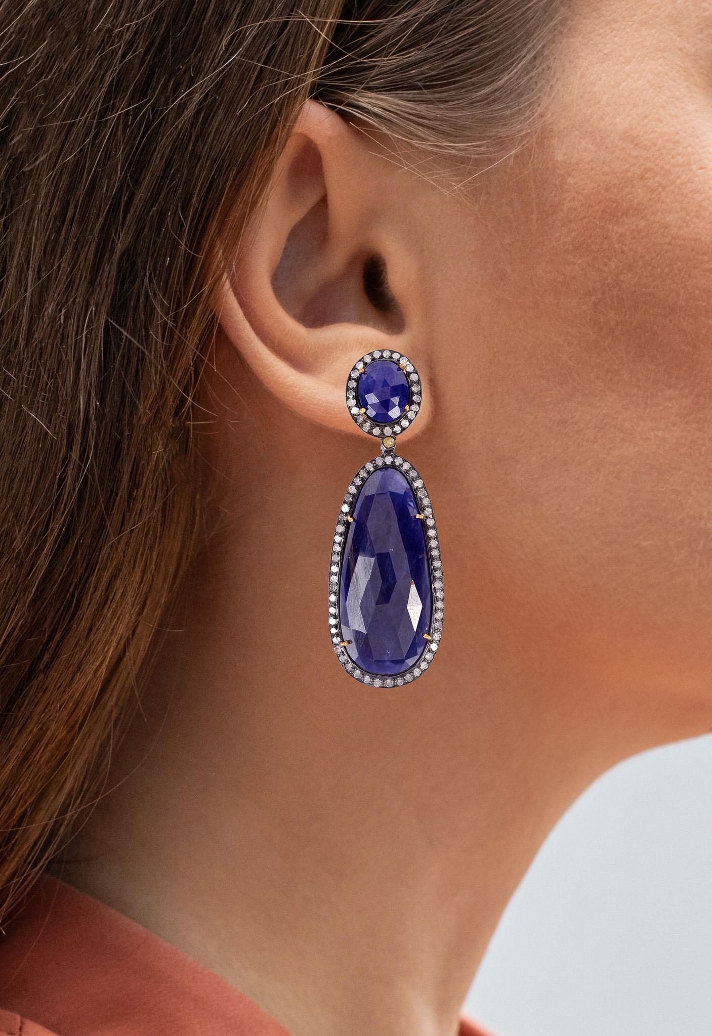 It comes with the appraisal by GIA GG/AJP
All Gemstones are Natural
Sapphires = 55.25 Carats
Diamonds = 2.19 Carats
Cut: Mixed Cut
Earrings Dimensions: 58 x 20 mm
Metal: 18K Gold & Silver