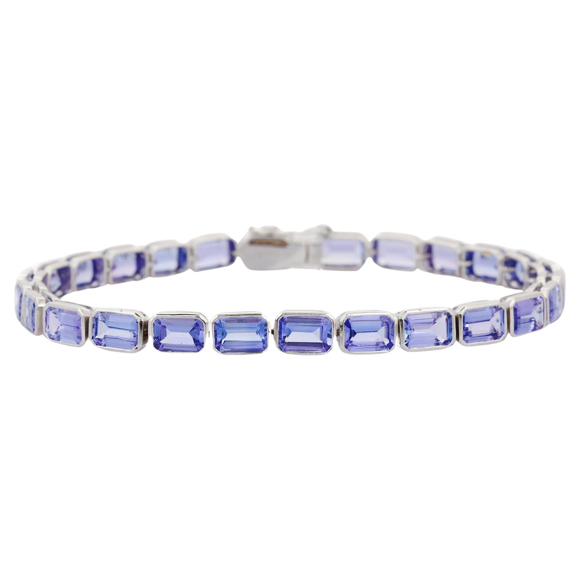 Natural Faceted Tanzanite Tennis Bracelet in 18 Karat Solid White Gold   For Sale