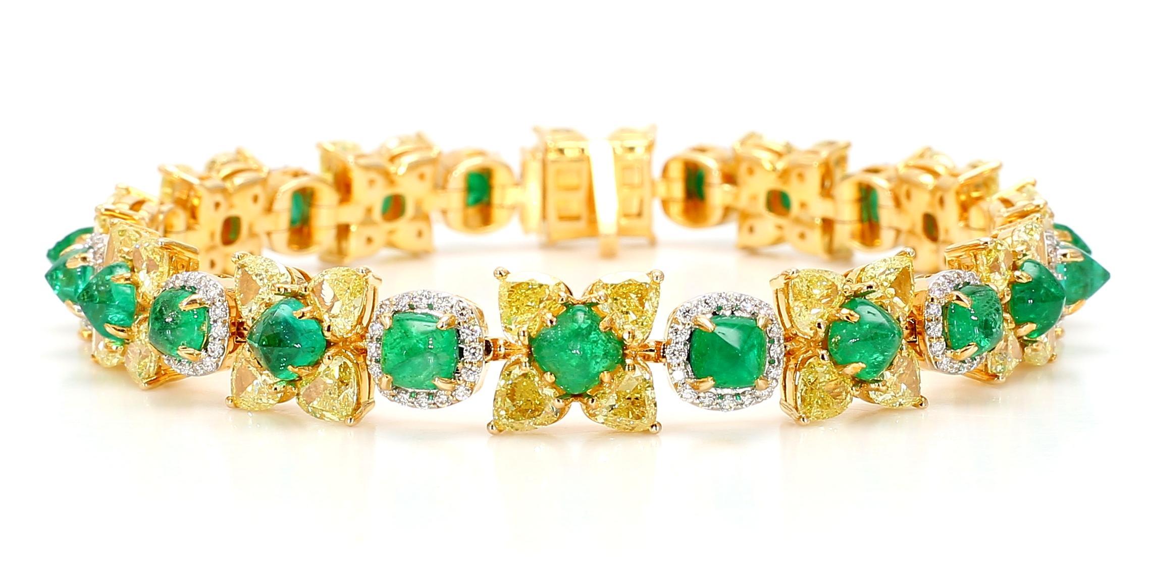 Make a bold statement with this luxurious bracelet, masterfully crafted in 18k gold and adorned with a vibrant mix of gemstones. Featuring 8.18 carats of rich green emeralds, 11.24 carats of radiant yellow fancy diamonds, and 0.96 carats of