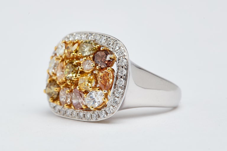 14K White and yellow gold ring with natural fancy colored (aprox 2.25 carats) and white (aprox 1.01 carats)  diamonds. Size 6 ring (modifiable)