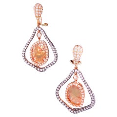 Pendientes de oro amarillo con diamante natural de color fantasía y diamante blanco