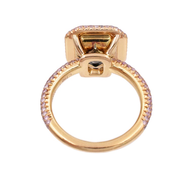 NALLY Exquisite Diamond Ring, with 3.60 carat Cut-Cornered Rectangular Modified Brilliant Cut center diamond
Color: Natural Fancy Green-Yellow, 
Clarity: VS1. 
Gia#xxxxxxxxxx
Surrounded with 180 pink color Round Brilliant Stones with total weight of