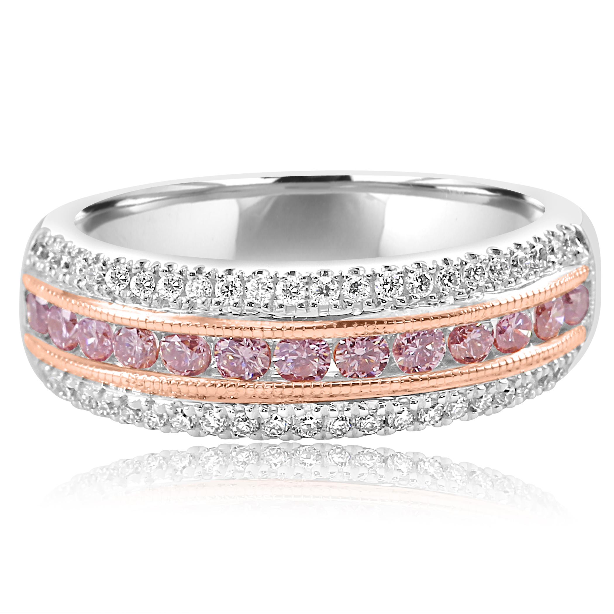Gorgeous Natural Pink Diamonds 0.47 Carat Flanked By Two Rows of White Diamond Round on the Sides 0.28 Carat  in 18K White and Rose Gold Band Ring.

Total Diamond Weight 0.75 Carat

Style available in different price ranges, can be customized or