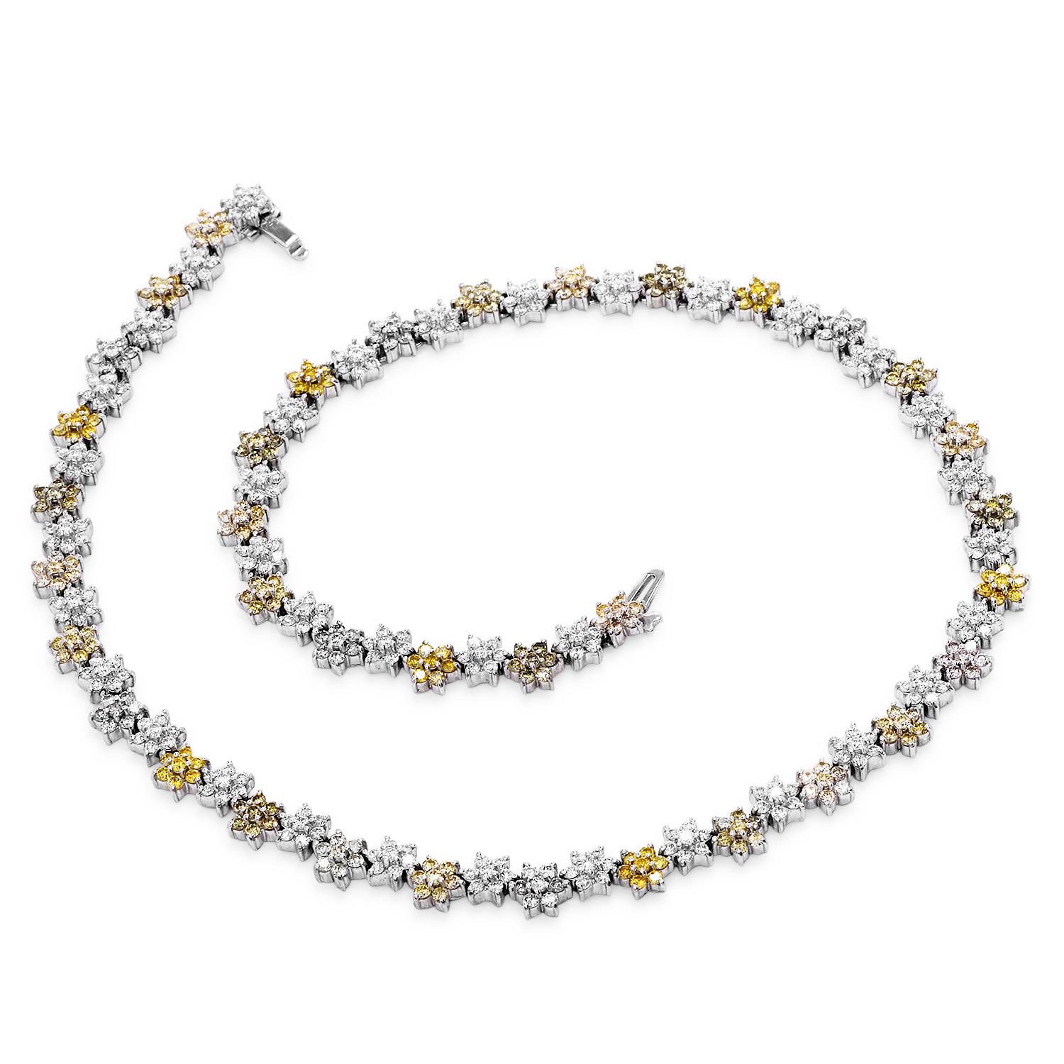 Colorful & highly sparkly diamonds adorn this flower-inspired link necklace.

This beautiful diamond necklace is crafted in 18K white gold, weighing 38.3 grams and measuring 16” long.

Composed by joyful natural fancy yellow, light pink-orange,