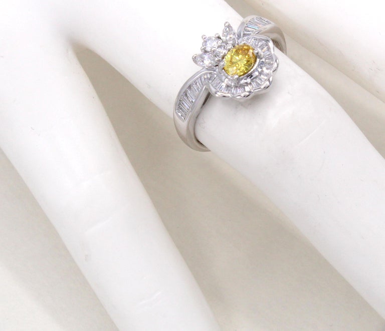 Oval Cut Natural Fancy Vivid Orange-Yellow Diamond Platinum Engagement Ring For Sale