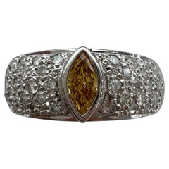 Natural Fancy Vivid Orange Yellow Marquise Cut Diamond Platinum Pave Band Ring