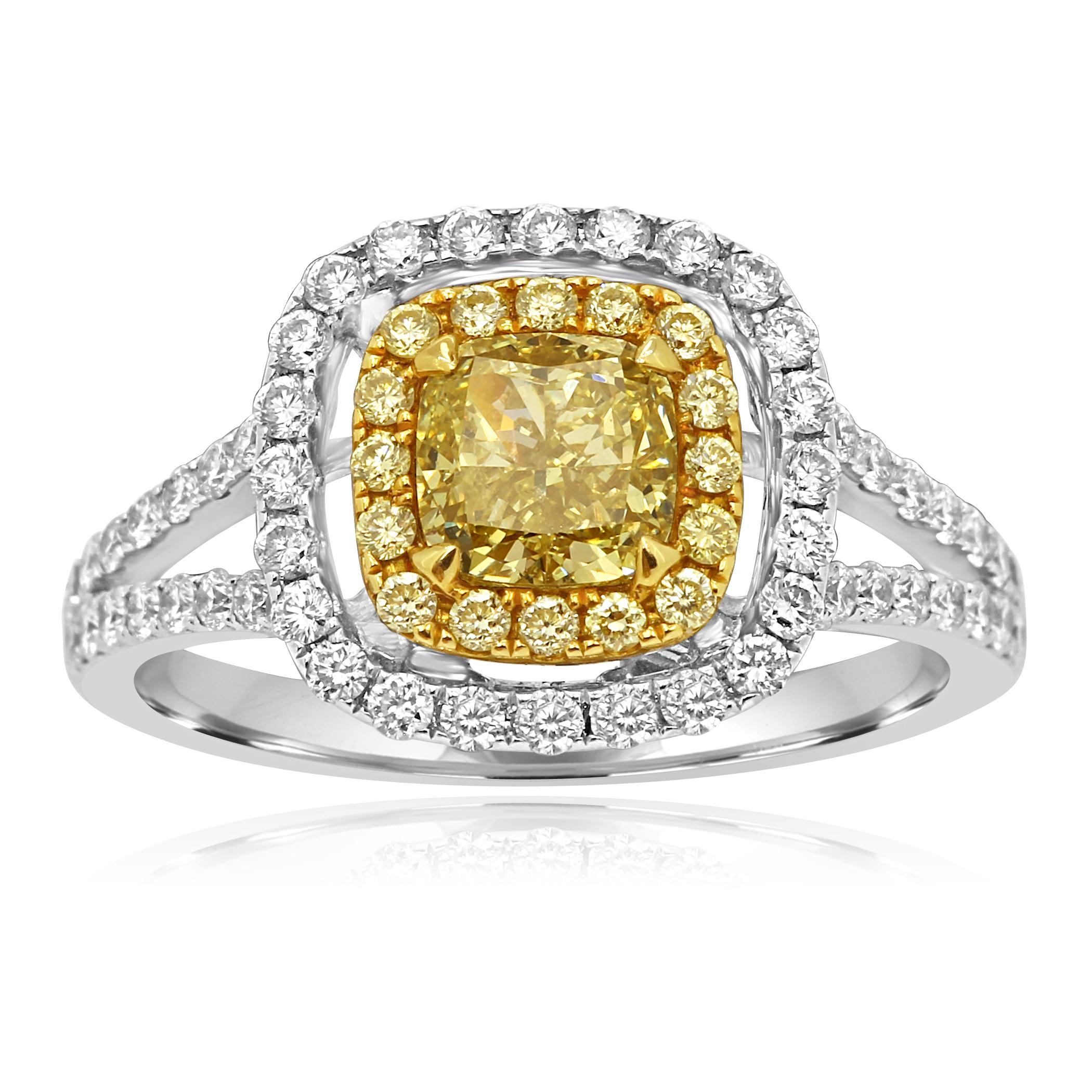 Gorgeous Natural Fancy Yellow Cushion Cut Diamond 1.02 Carat Si Clarity Encircled in Double Halo of Natural Fancy Yellow Round 0.26 Carat and Round White Diamond 0.59 Carat in Stunning 18K White and Yellow Gold Classic always in style Bridal and