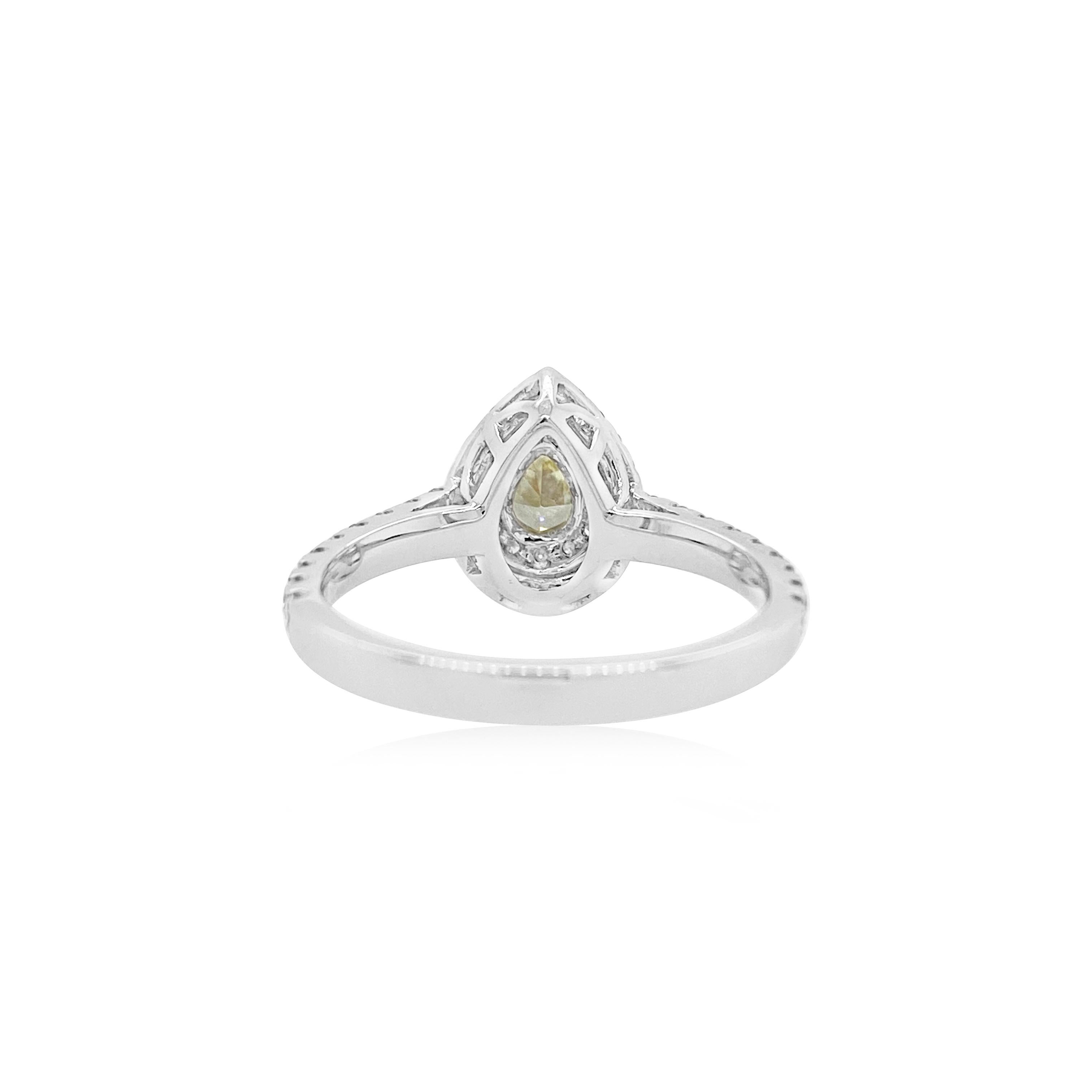 Contemporary Natural Fancy Yellow Diamond and White diamond Pear shape Engagement Ring For Sale