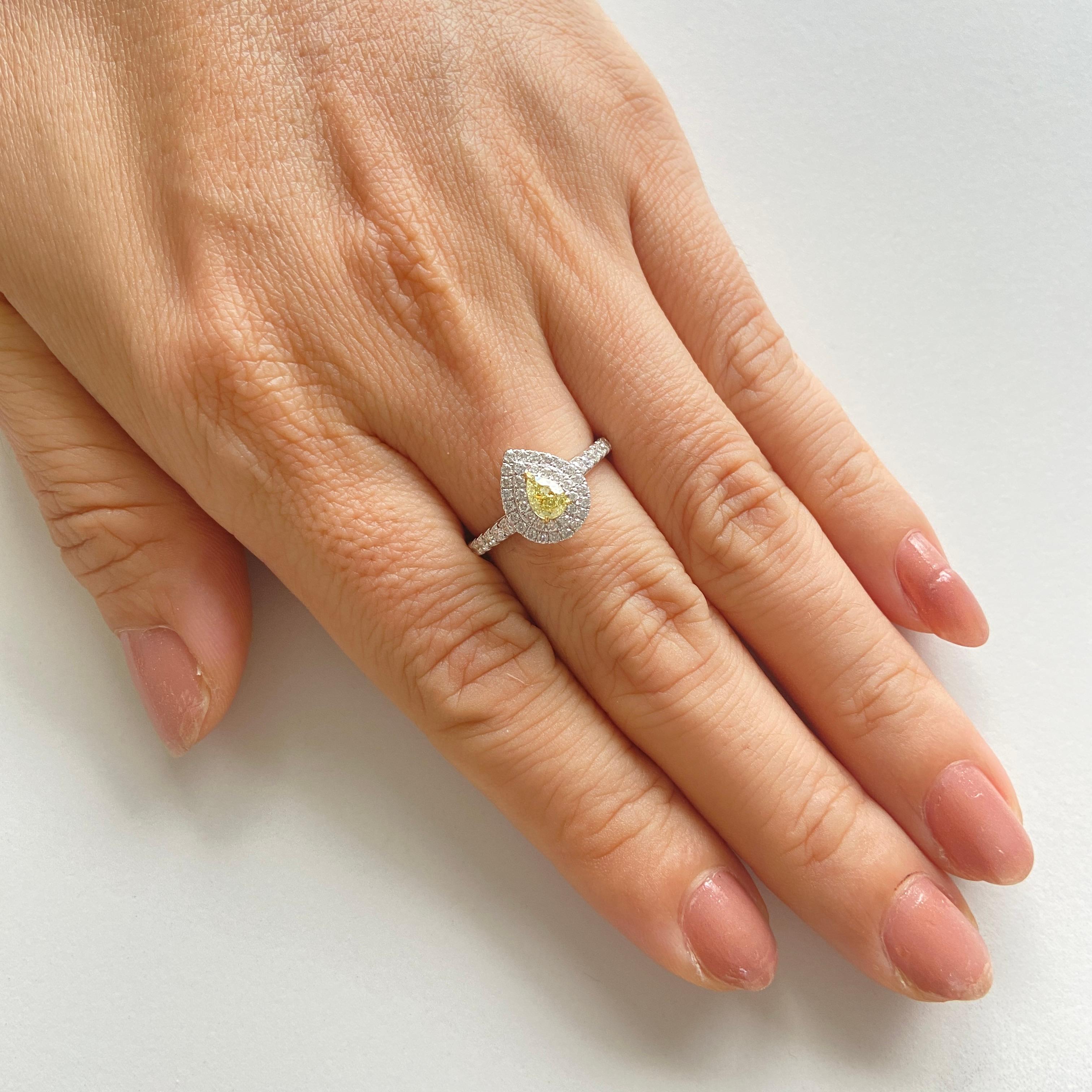 Natural Fancy Yellow Diamond and White diamond Pear shape Engagement Ring In New Condition For Sale In Hong Kong, HK