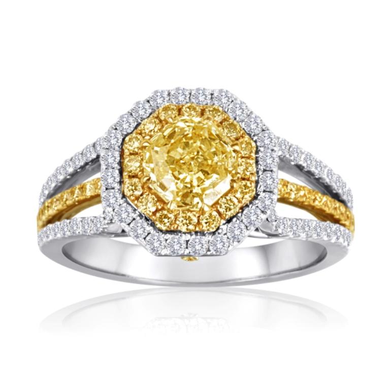 Gorgeous 8 Corner Fancy Shape Natural Fancy Yellow Diamond 1.03 Carat Encircled in Double Halo of Natural Fancy Yellow Round Diamonds 0.46 Carat and White Diamond Rounds 0.61 Carat Set in 18K White and Yellow Gold Three Prong Shank Ring.

Style