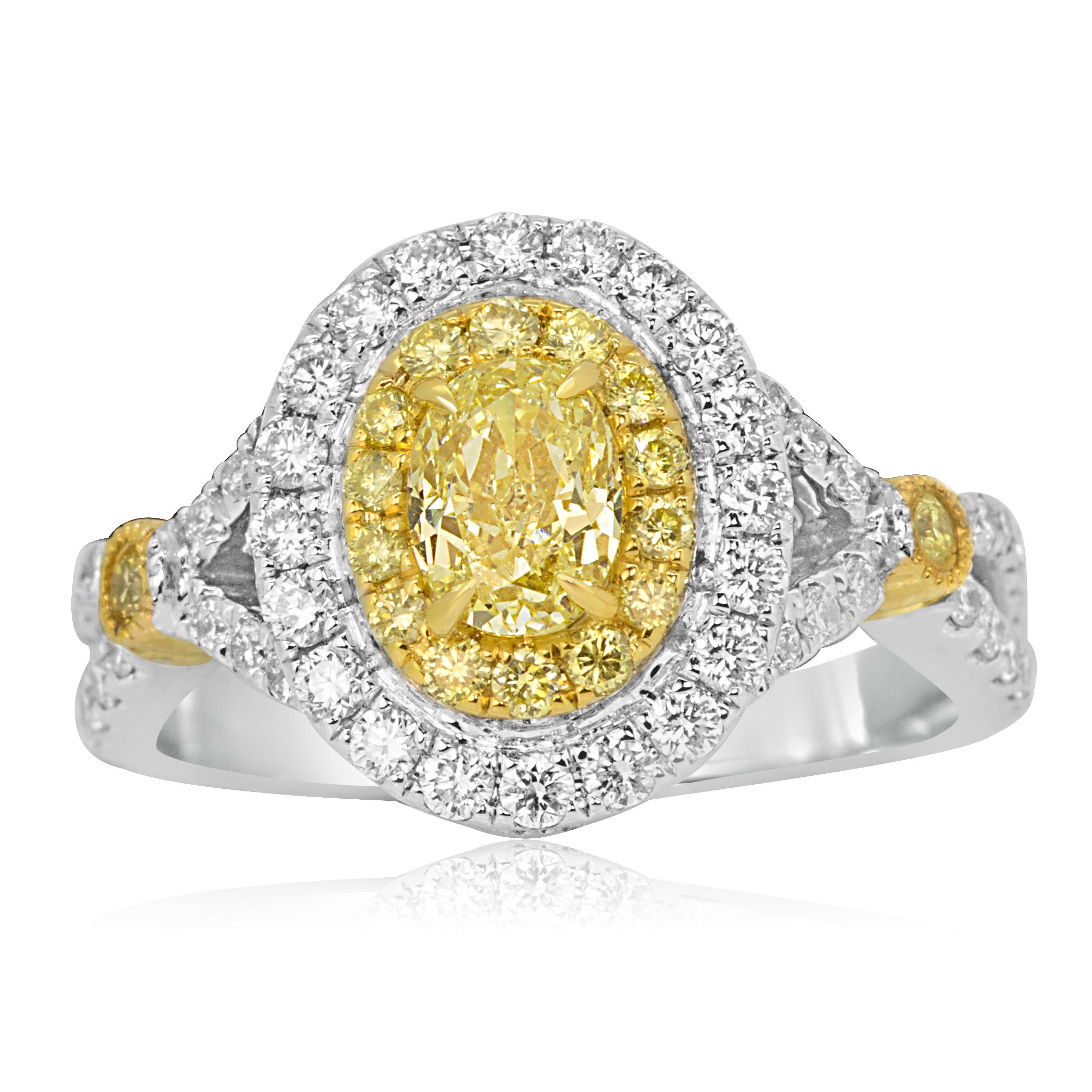 Natural Fancy yellow Diamond Oval 0.73 Carat Encircled in Double Halo of Natural Fancy Yellow Round Diamonds 0.22 Carat and White Round Diamonds 0.68 Carat in Stunning and Classic 18K White and Yellow Gold Bridal Or Fashion Ring.

Style available in
