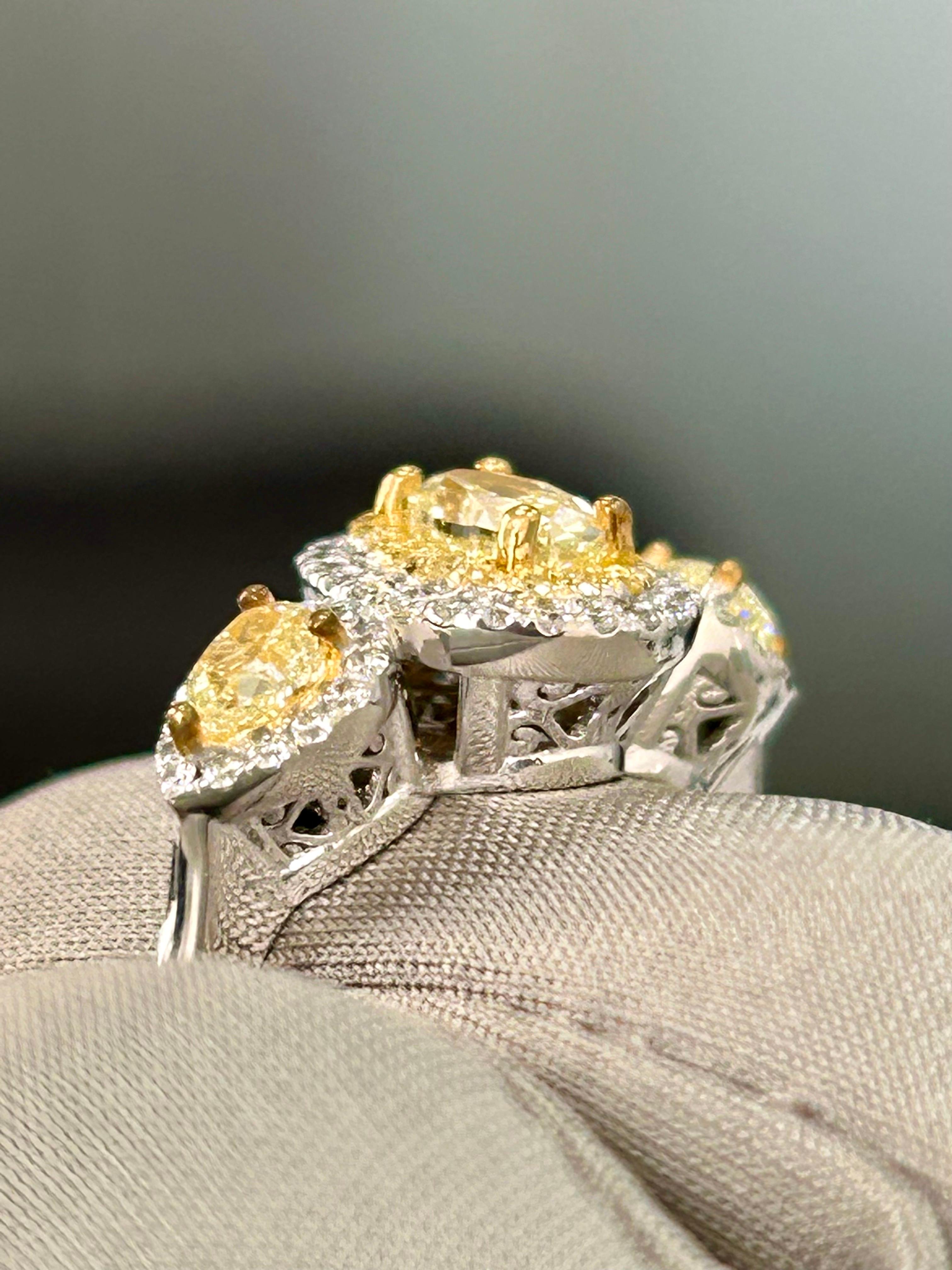 3 stone yellow diamond ring