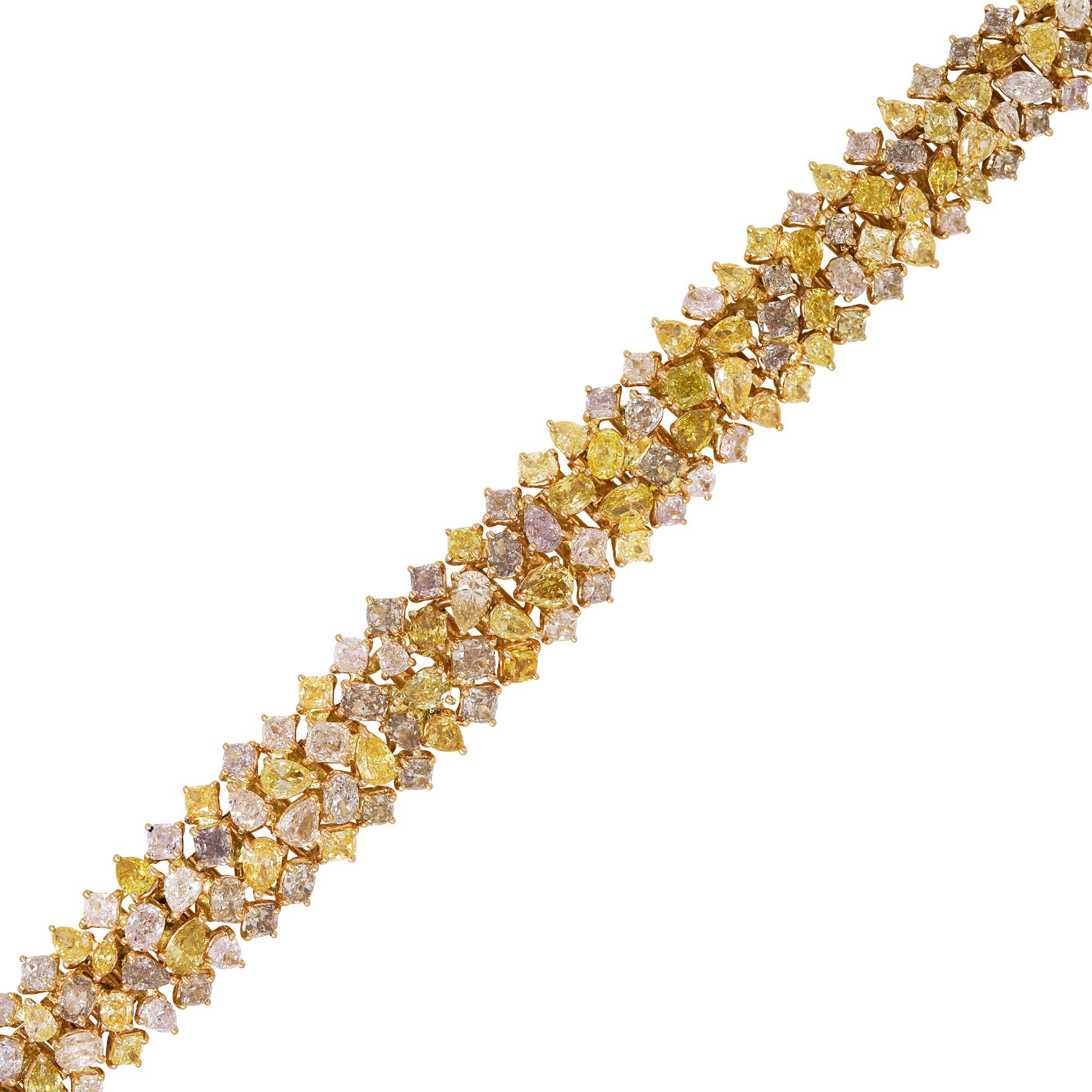 18k Rose Gold Natural 24.03ctw Fancy Yellow, Pink & Orange Diamond Multi-Shape Bracelet

Material: 18k Rose Gold
Diamond Details: There are approximately 24.03 carats of natural, fancy intense yellow, intense orange, and pink diamonds. All 186