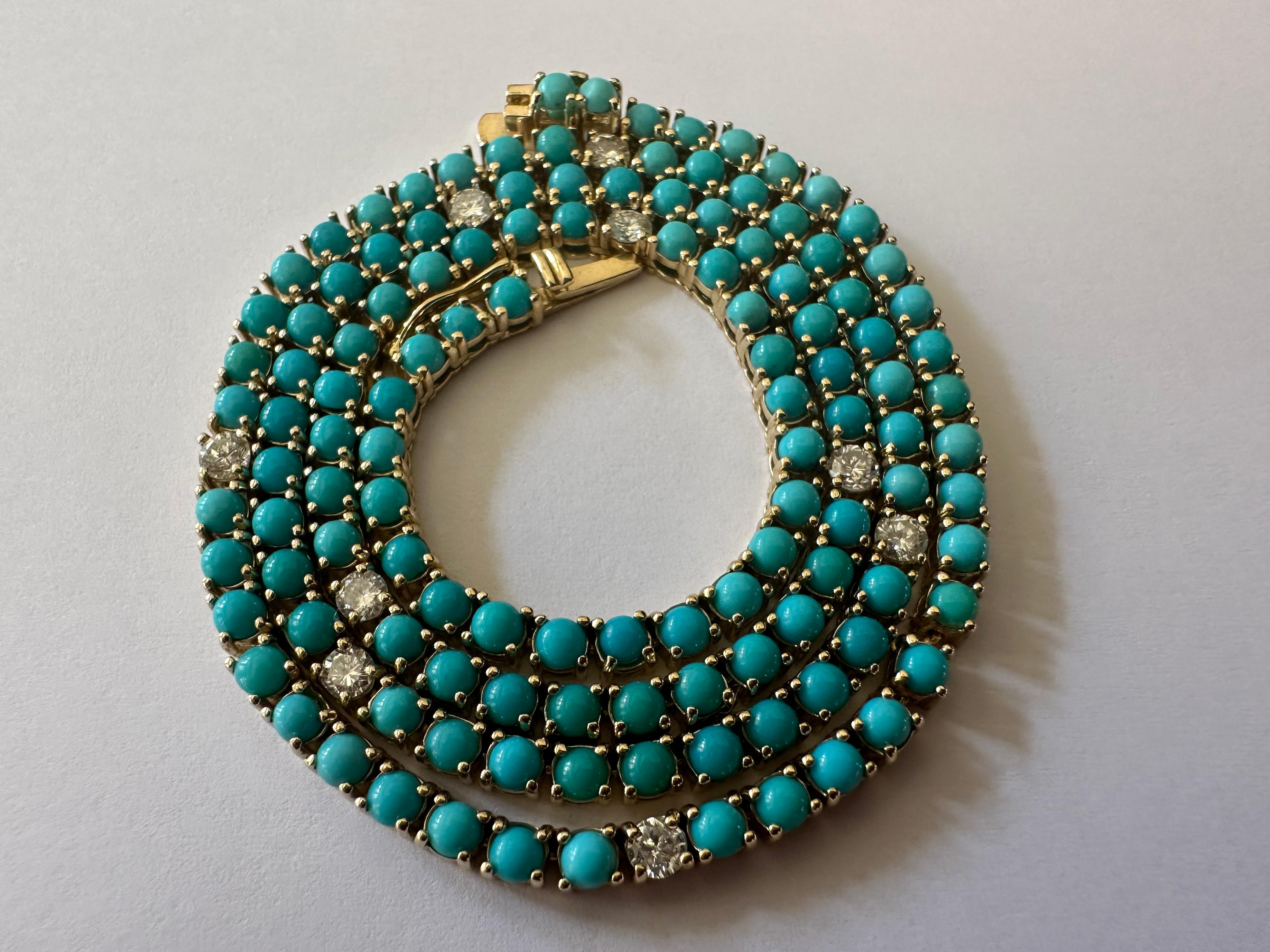 This exquisite tennis necklace set in 14K yellow gold features one hundred twenty-two natural fine turquoise round-shaped cabochons-- all hand cut to match-- interspersed with nine natural round brilliant-cut diamonds totaling 0.89 carats, F-G