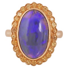 Opale de feu naturelle et saphir jaune  Bague en or 18 carats