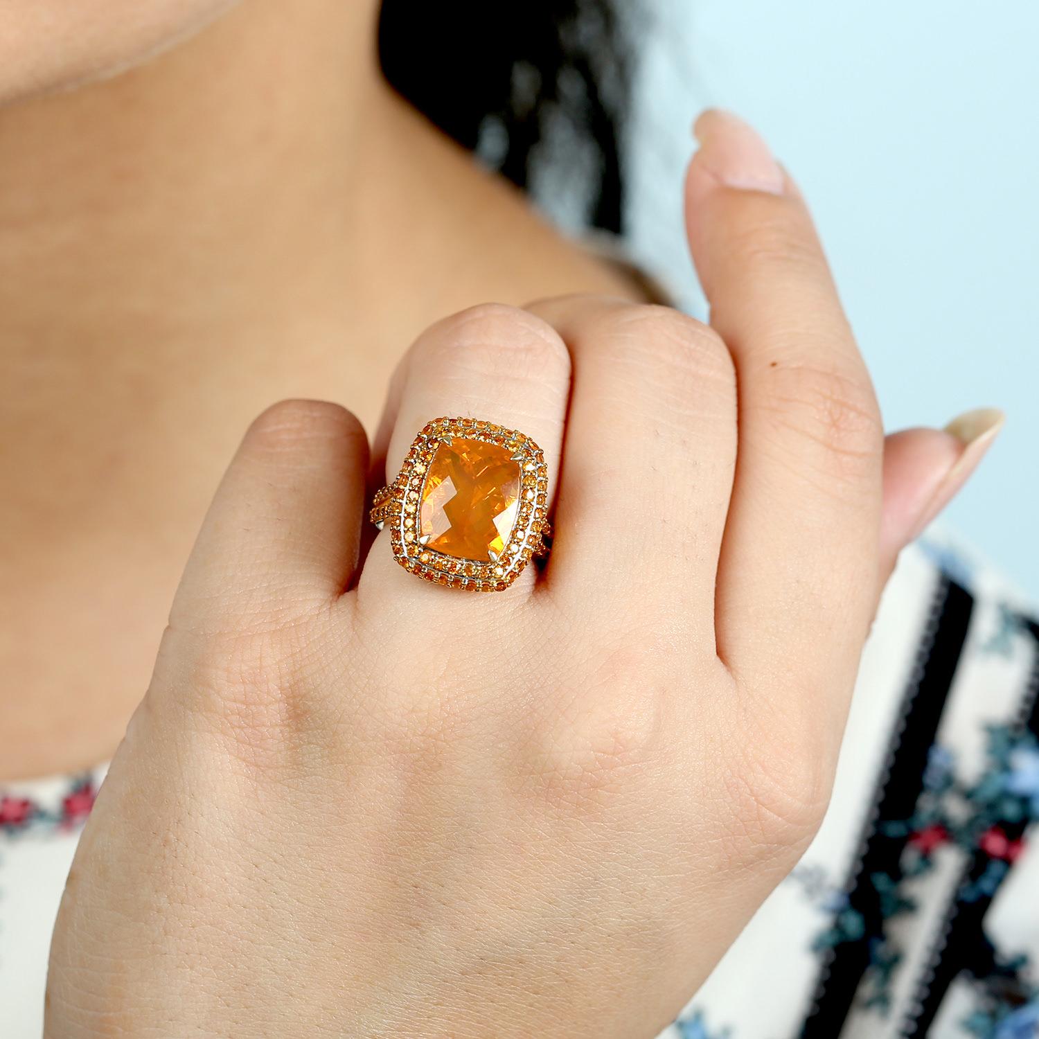 It comes with the Gemological Appraisal by GIA GG/AJP
All Gemstones are Natural
Fire Opal = 6.32 Carats
Orange Garnets = 2.83 Carats
Metal: 18K Yellow Gold
Ring Size: 7* US
*It can be resized complimentary
