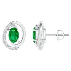 Orecchini con smeraldo naturale fluttuante da 0,80ct e diamante in oro bianco 14K