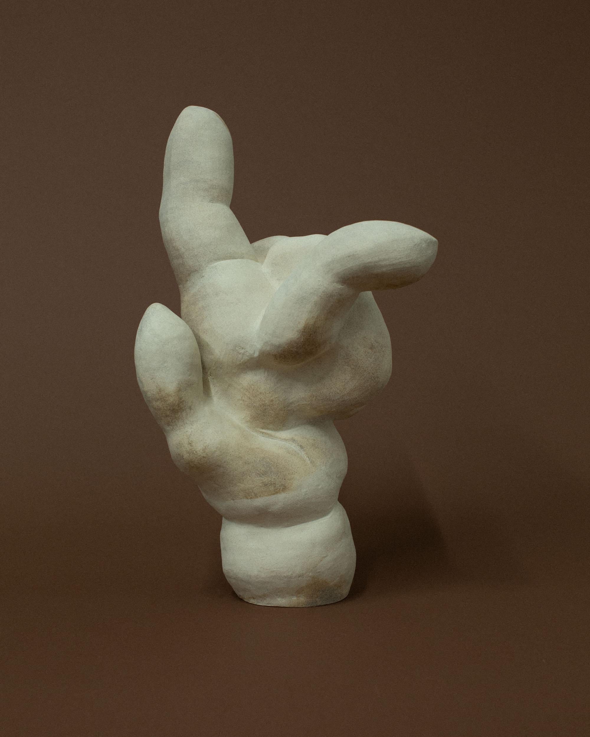 Natural Folding Hand Sculpture by Common Body
Dimensions: W 31 x D 26 x H 49 cm
Materials: Natural Stoneware

Common body is a sculpture and interior object studio founded by nathaniel kyung smith, an artist whose passion lies in the intersection of