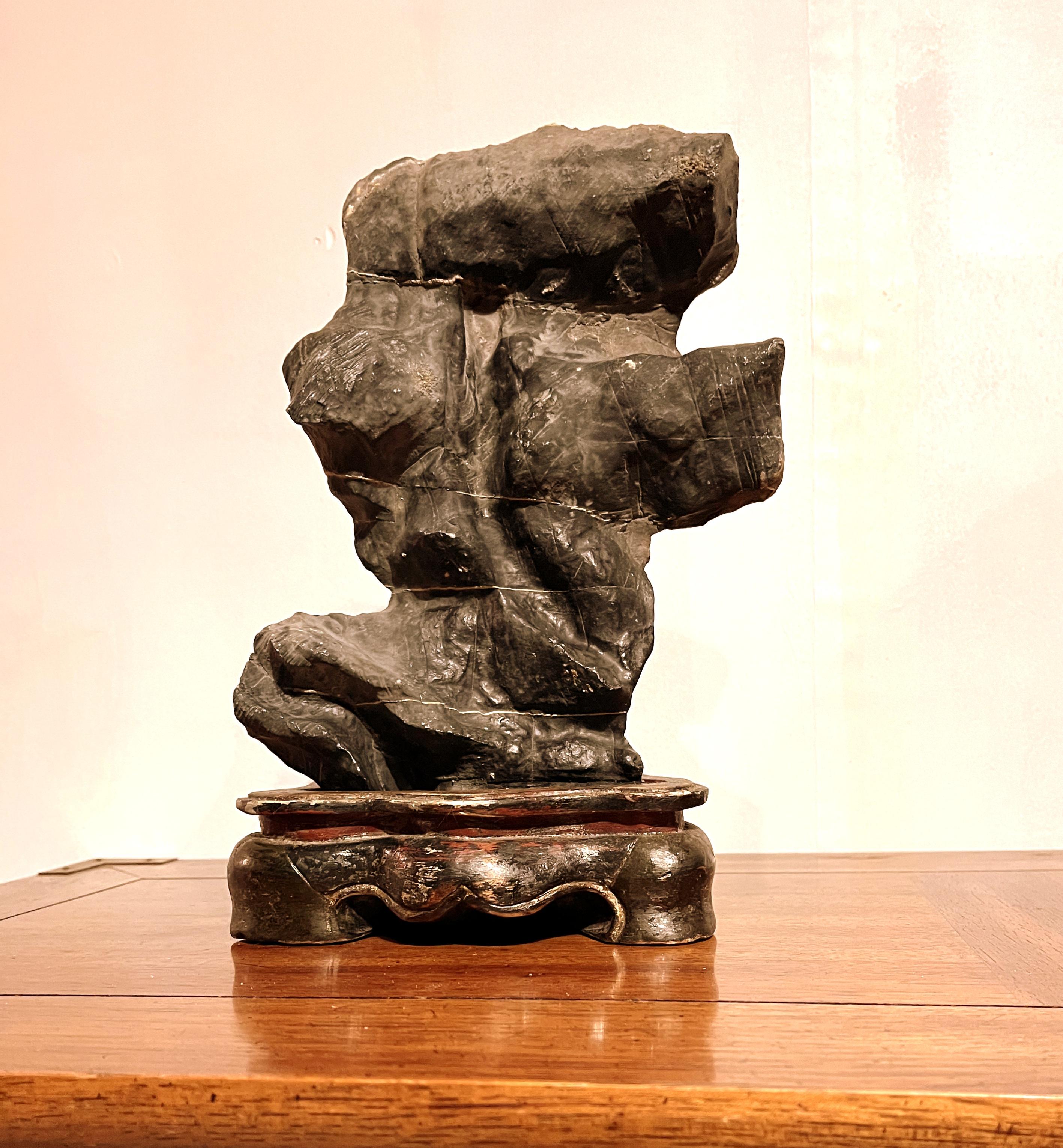 Antique Chinese natural form scholar rock with antique wooden base
Scholar's object used for creativity and imagination to inspire 