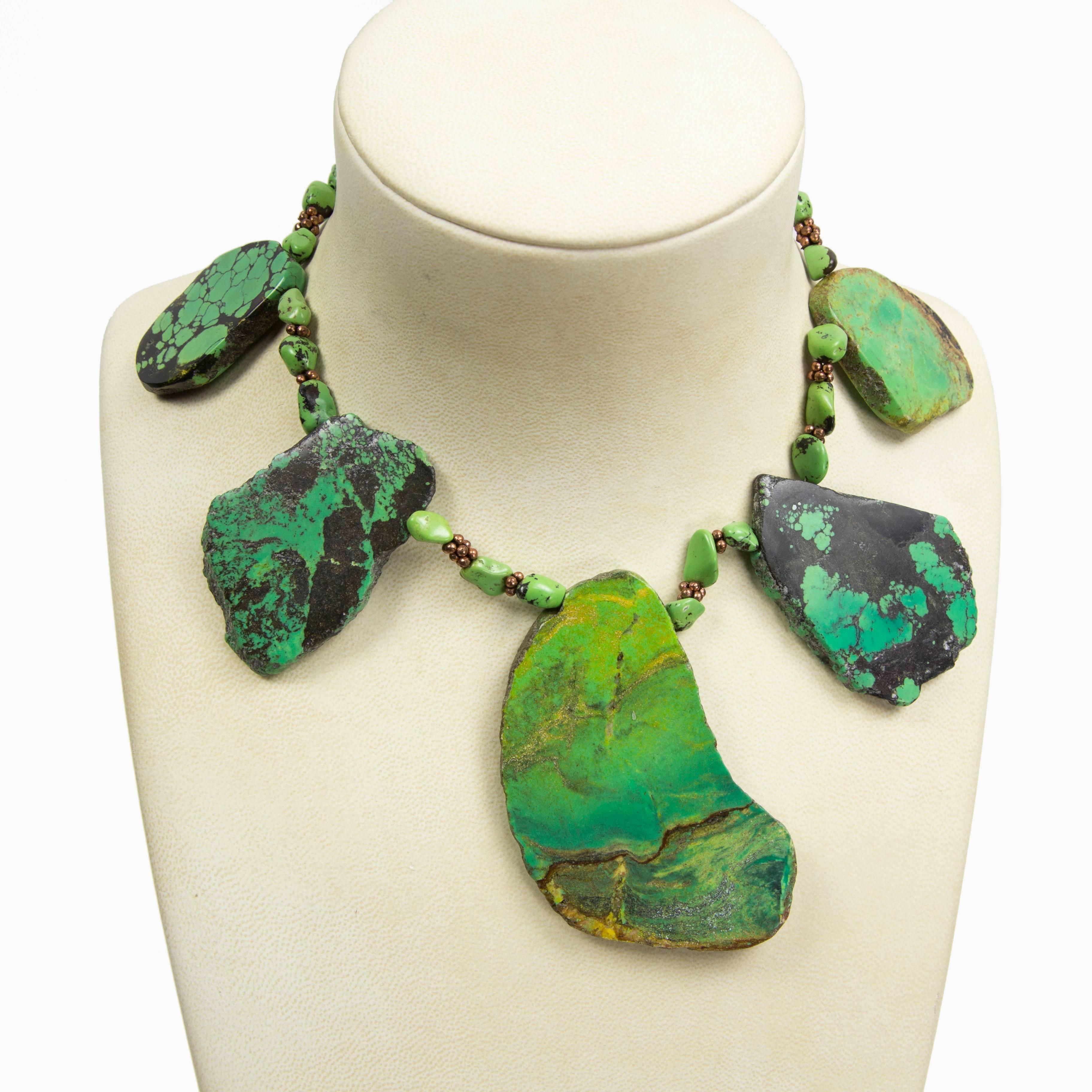 Fabulous necklace featuring five spectacular large High Quality Free-form Turquoise slices showcasing the best display of their individual color variations and shapes, a natural wonder…one more beautiful than the other! inter-spaced with natural
