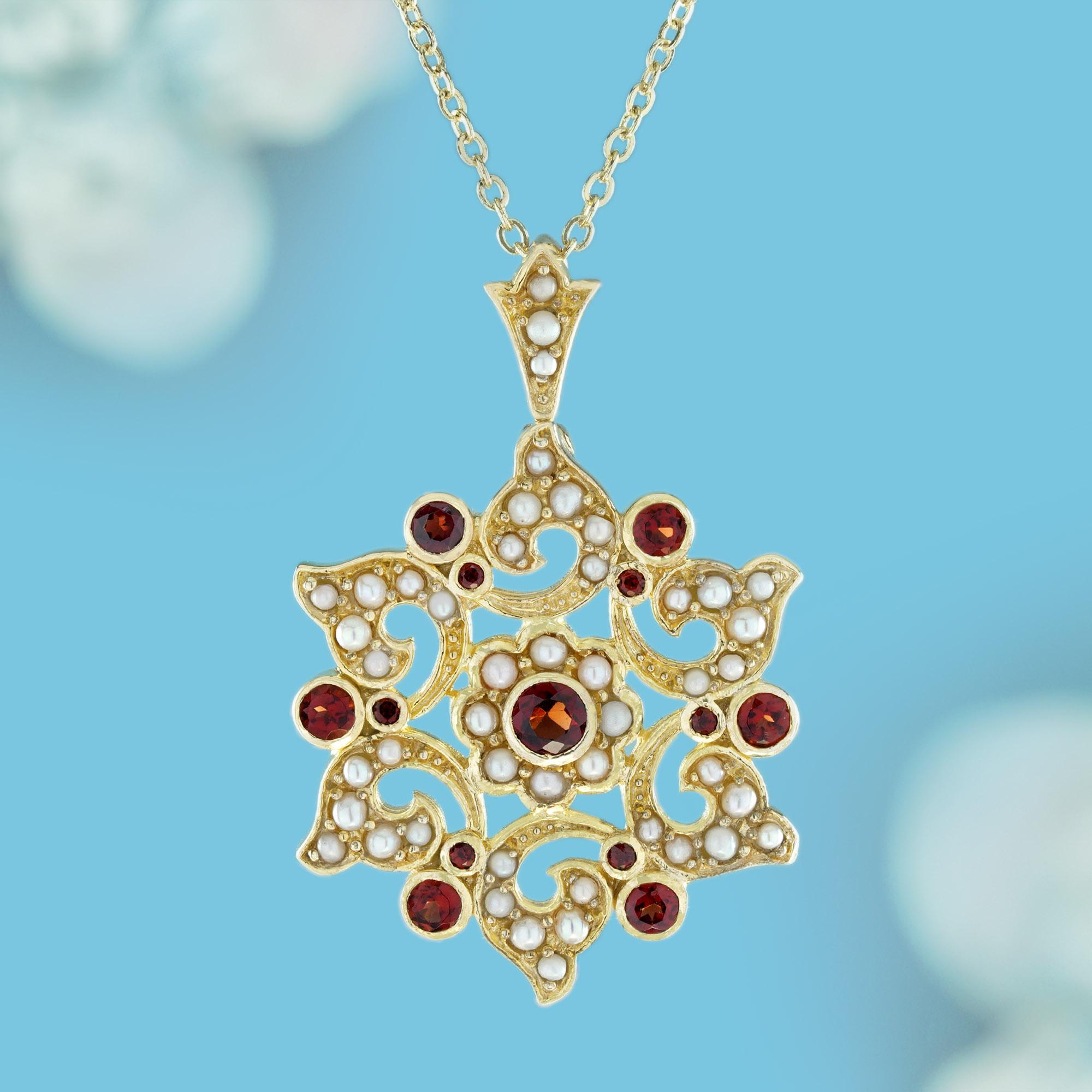 This floral cluster pendant, inspired by vintage aesthetics, showcases a captivating round deep red garnet at its center, encircled by six smaller round garnets, resulting in a dazzling and attention-grabbing composition. The gold setting gently