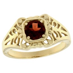 Bague de style vintage en or jaune 9K avec grenat naturel ajouré